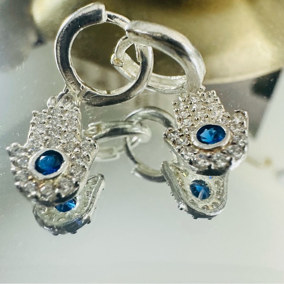 Elegant Silver Hamsa Earrings with Blue Zircon Accents - Picture 9 of 10